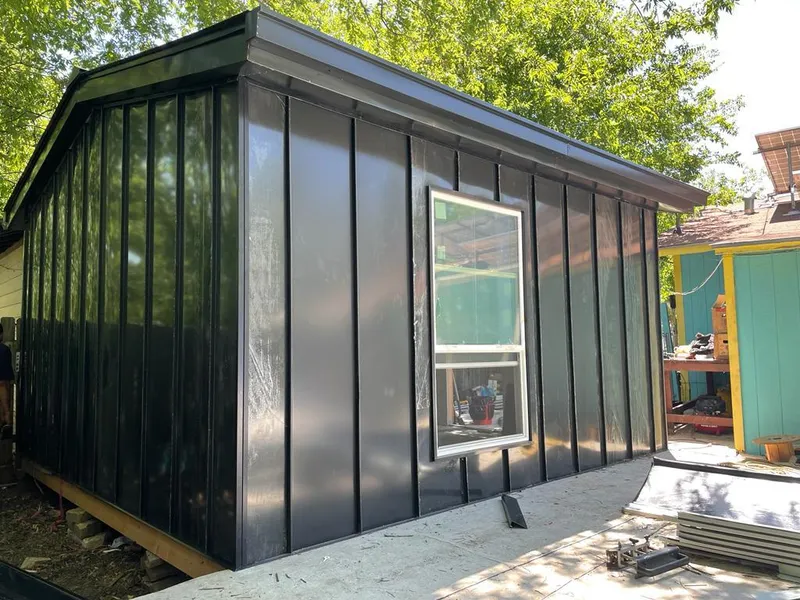 Black standing seam metal wall panels for Metal Roof Installation in Lilburn