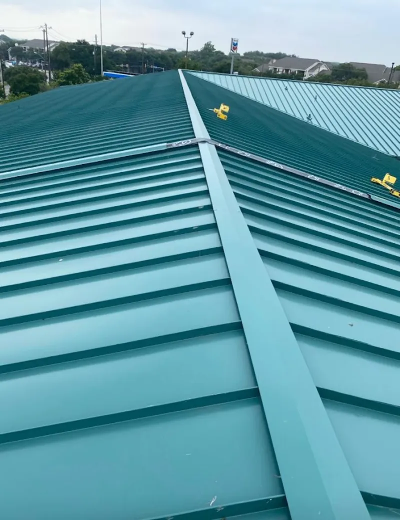 Green commercial metal roof ridge and valley for Metal Roof Repair in Lilburn