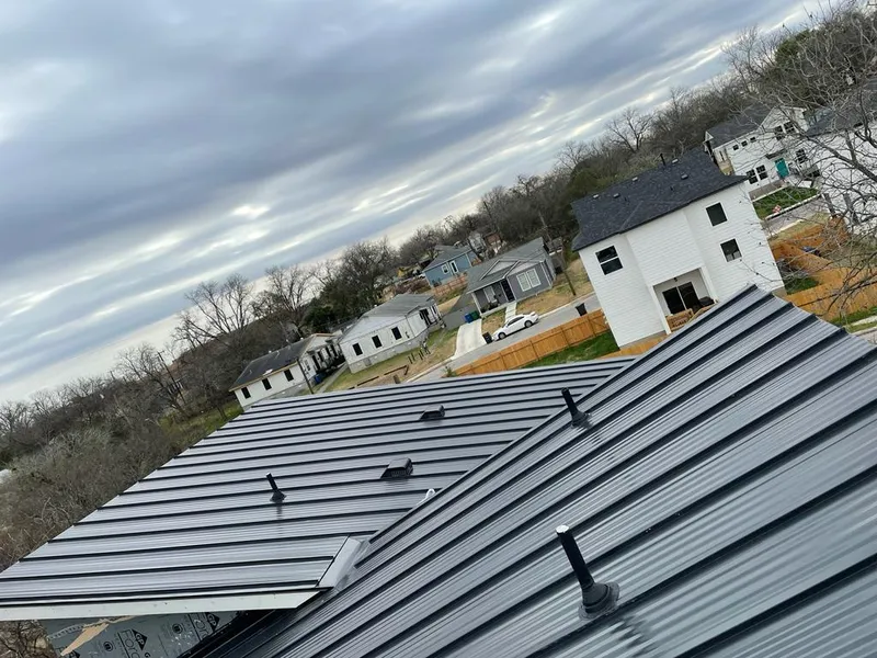 Standing seam metal roof panels with vents for Skylight Repair in Lilburn